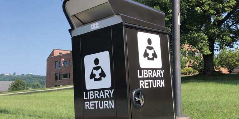 A Floyd County Library book drop box