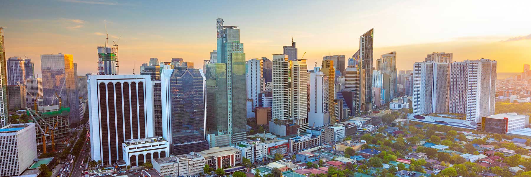 View of Makati city skyline at sunset in the Philippines